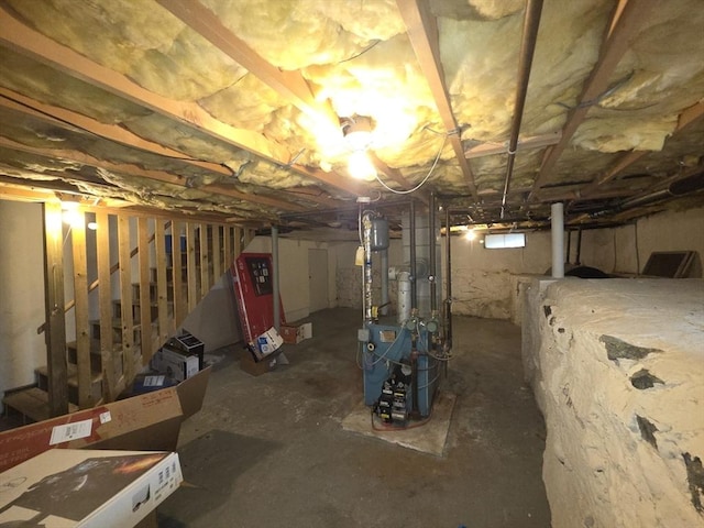 2018-2020 Prospect St, Palmer, MA 01080 - below grade area featuring a heating unit and stairs