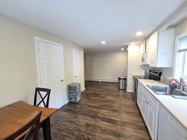 2018-2020 Prospect St, Palmer, MA 01080 - kitchen with white appliances, a sink, light countertops, recessed lighting, and white cabinets
