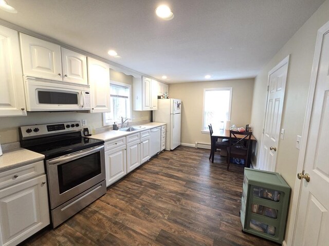 2018-2020 Prospect St, Palmer, MA 01080 - kitchen with white appliances, a sink, dark wood finished floors, recessed lighting, and white cabinets