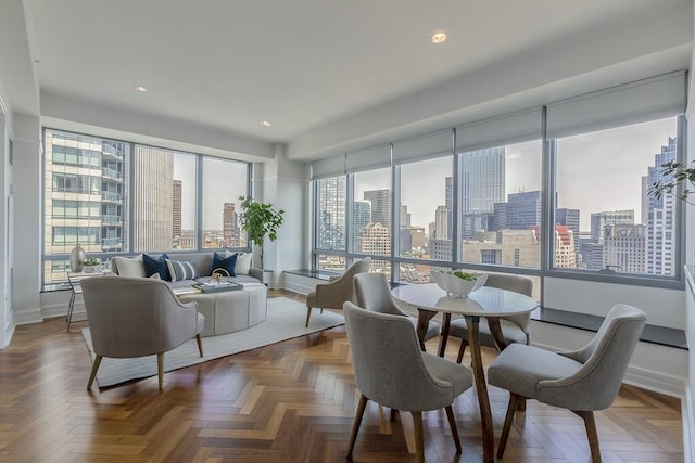 dining area with parquet flooring