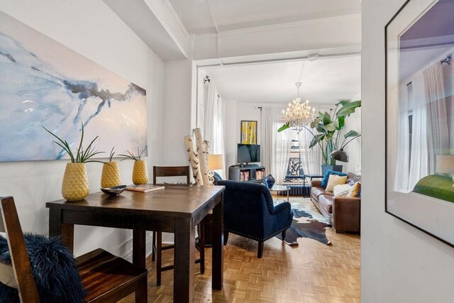 office with a chandelier and ornamental molding
