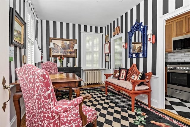 685 Highland St, Marshfield, MA 02050 - sitting room featuring radiator and wallpapered walls