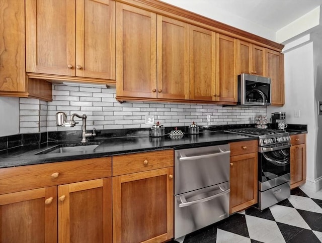 685 Highland St, Marshfield, MA 02050 - kitchen featuring appliances with stainless steel finishes, dark floors, tasteful backsplash, brown cabinetry, and dark stone counters