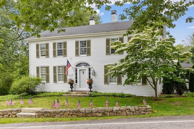 685 Highland St, Marshfield, MA 02050 - colonial-style house featuring a front yard and a chimney