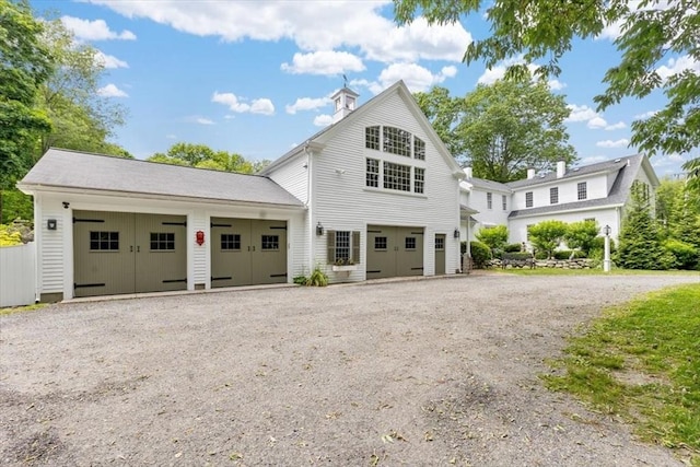 685 Highland St, Marshfield, MA 02050 - view of front of home with dirt driveway and a garage