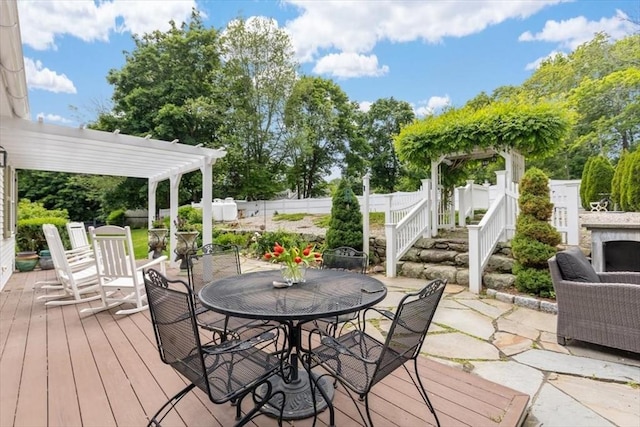 685 Highland St, Marshfield, MA 02050 - wooden deck featuring a pergola, a fenced backyard, outdoor dining area, and a patio area