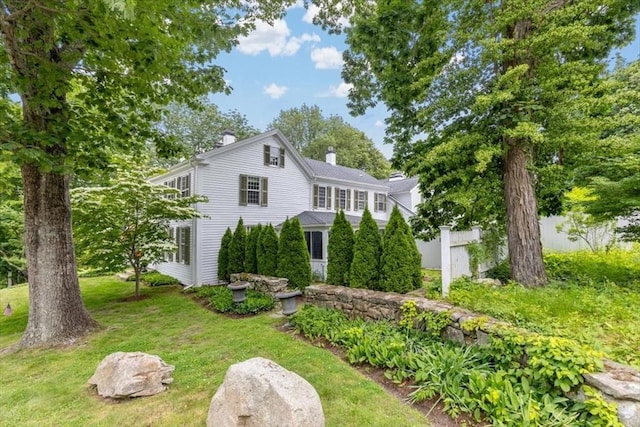 685 Highland St, Marshfield, MA 02050 - view of front of home featuring a chimney