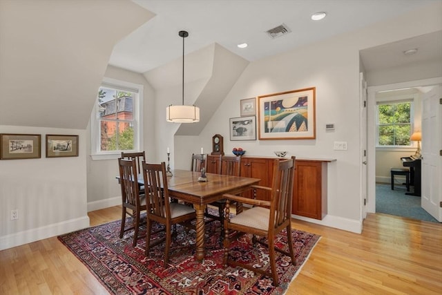 37 Waverly Unit 37, Brookline, MA 02445 - dining room featuring light wood-type flooring, vaulted ceiling, and baseboards