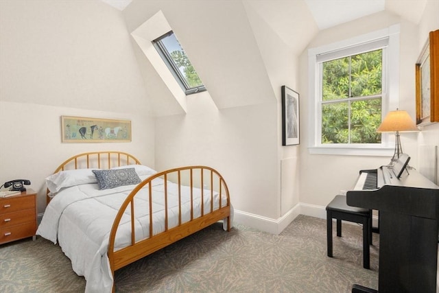 37 Waverly Unit 37, Brookline, MA 02445 - carpeted bedroom featuring a skylight, lofted ceiling, multiple windows, and baseboards