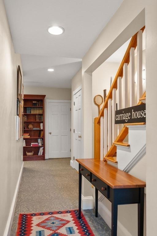 37 Waverly Unit 37, Brookline, MA 02445 - hall with baseboards, carpet floors, stairs, and recessed lighting