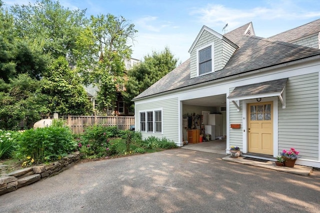 37 Waverly Unit 37, Brookline, MA 02445 - view of side of home featuring roof with shingles