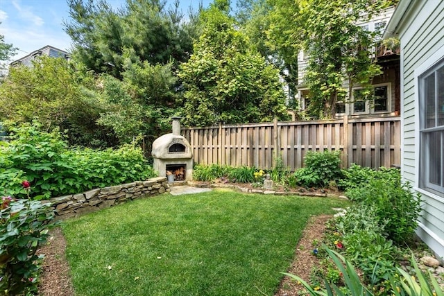 37 Waverly Unit 37, Brookline, MA 02445 - view of yard with an outdoor fireplace