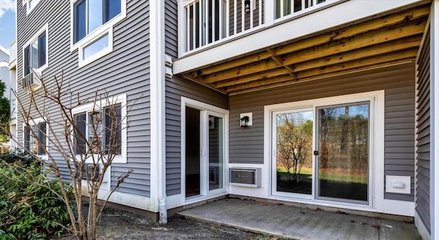 property entrance with a balcony