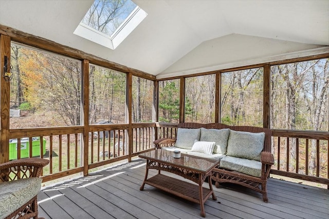sunroom with outdoor lounge area and a skylight