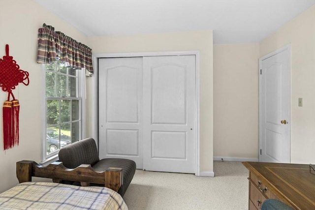 63 Forge Rd, Sharon, MA 02067 - bedroom with a closet, light colored carpet, and baseboards
