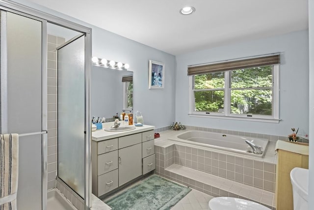 63 Forge Rd, Sharon, MA 02067 - full bath featuring vanity, a bath, a stall shower, tile patterned floors, and recessed lighting