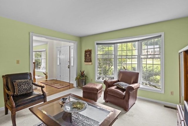 63 Forge Rd, Sharon, MA 02067 - carpeted living room featuring baseboards