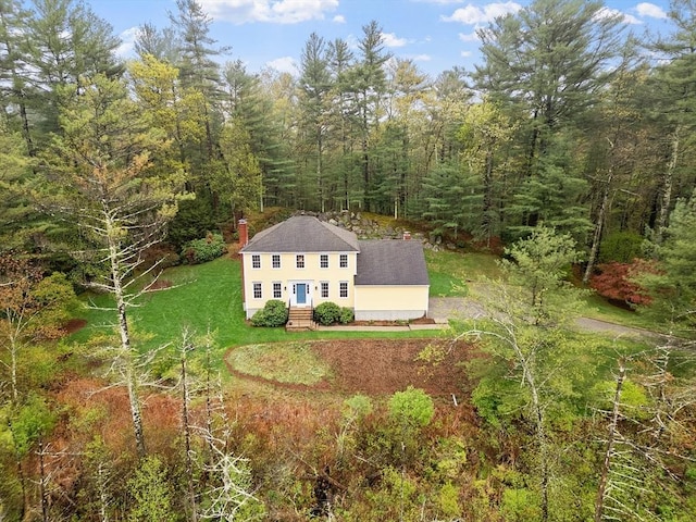 94 Brook St, Carlisle, MA 01741 - aerial view of property and surrounding area featuring a heavily wooded area