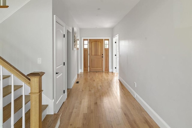 16 Pine Hill Rd Unit 16, Wenham, MA 01984 - hallway featuring stairs and light wood-type flooring