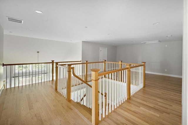 16 Pine Hill Rd Unit 16, Wenham, MA 01984 - hall with light wood-style flooring, an upstairs landing, and recessed lighting