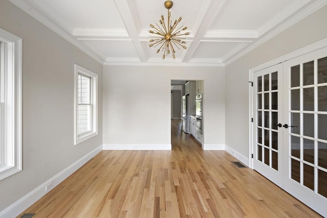 16 Pine Hill Rd Unit 16, Wenham, MA 01984 - spare room featuring a chandelier, coffered ceiling, french doors, light wood-type flooring, and beamed ceiling