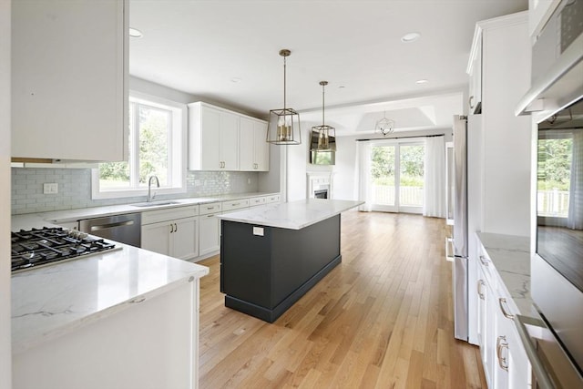 16 Pine Hill Rd Unit 16, Wenham, MA 01984 - kitchen featuring healthy amount of natural light, dishwasher, gas stovetop, tasteful backsplash, and recessed lighting