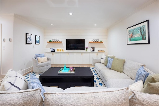 living area with recessed lighting, ornamental molding, and light wood finished floors