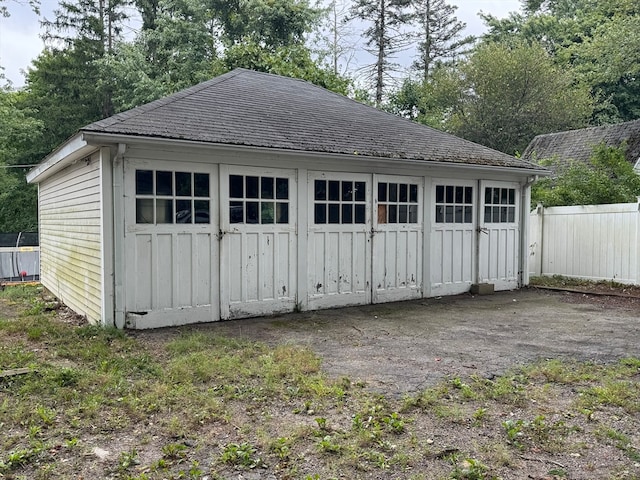 view of outdoor structure with a garage