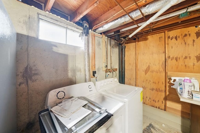 laundry area featuring washer and clothes dryer and laundry area