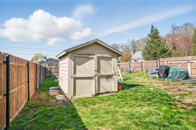 view of shed featuring a fenced backyard