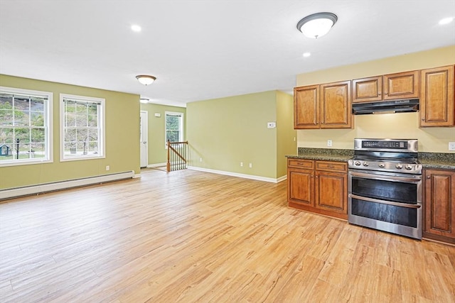 50 Maggie Ln, Southbridge, MA 01550 - kitchen featuring double oven range, under cabinet range hood, light wood finished floors, brown cabinets, and recessed lighting