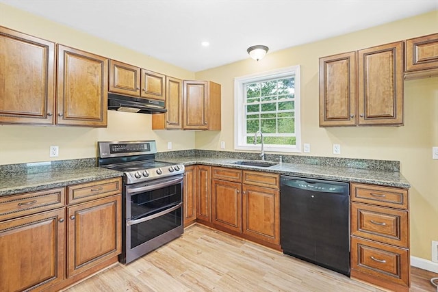 50 Maggie Ln, Southbridge, MA 01550 - kitchen with dishwasher, double oven range, under cabinet range hood, a sink, and brown cabinets