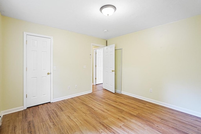 50 Maggie Ln, Southbridge, MA 01550 - unfurnished bedroom with light wood finished floors and baseboards