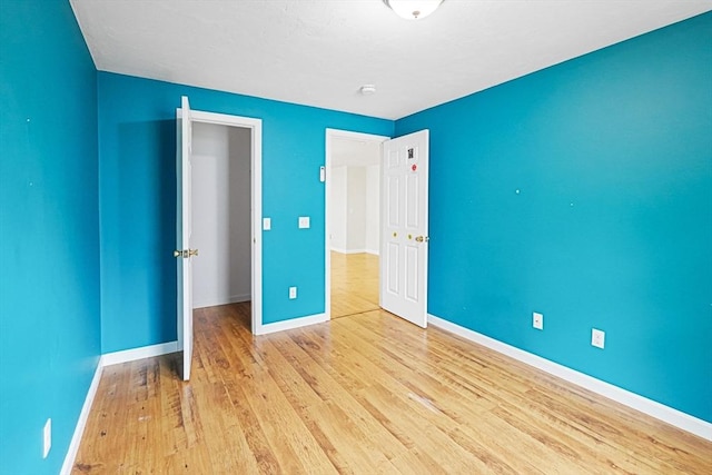 50 Maggie Ln, Southbridge, MA 01550 - unfurnished bedroom featuring wood finished floors and baseboards