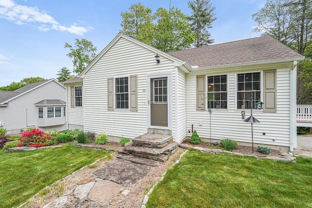 50 Maggie Ln, Southbridge, MA 01550 - view of front facade featuring a front yard and a shingled roof