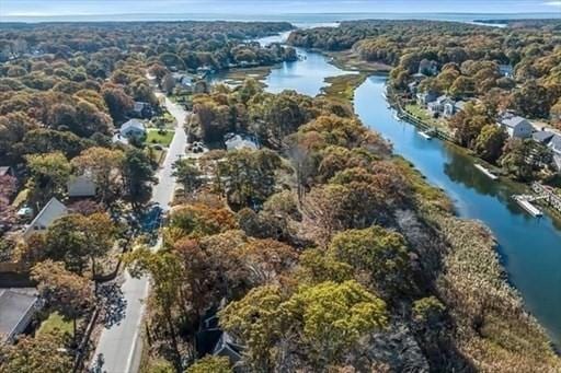 11 Madeline Rd, Falmouth, MA 02536 - aerial view of a nearby body of water and a forest