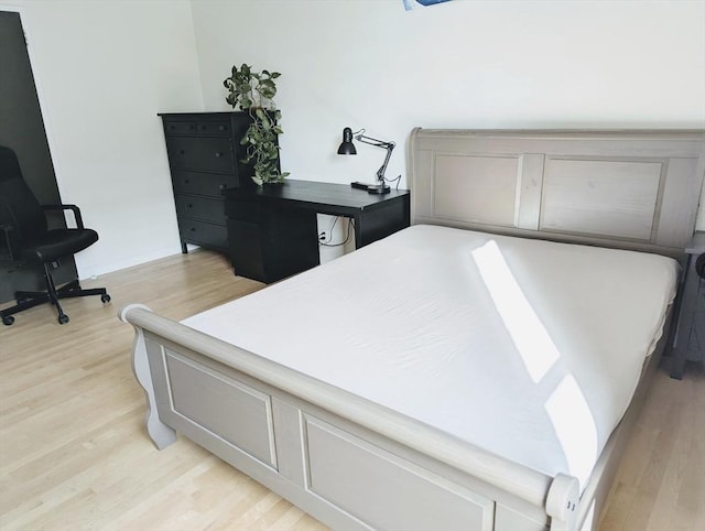 99 Pond Ave Unit 608, Brookline, MA 02445 - bedroom with light wood finished floors and baseboards