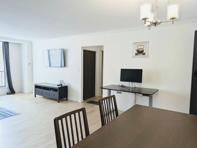 99 Pond Ave Unit 608, Brookline, MA 02445 - dining space with light wood-style flooring, a chandelier, ornamental molding, and baseboards