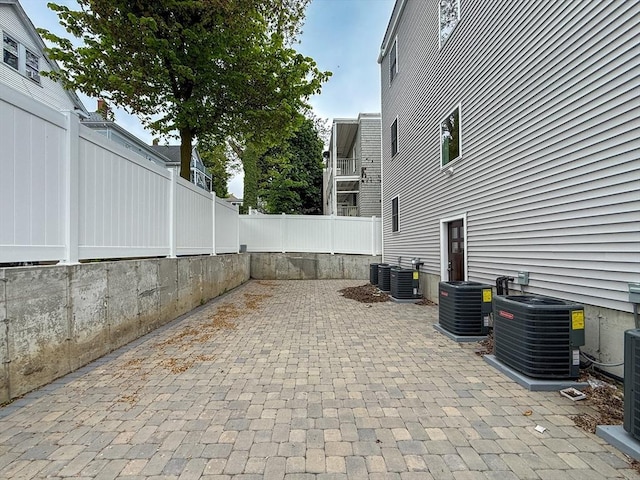 21 Thornton St Unit 4, Revere, MA 02151 - view of patio / terrace with central AC unit and a fenced backyard