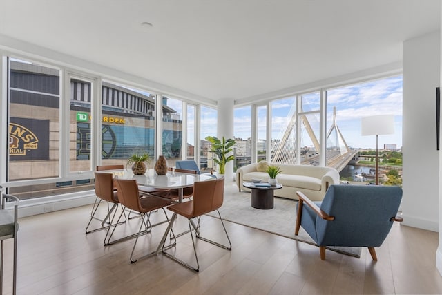 sunroom / solarium with a water view