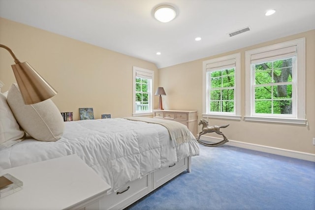 bedroom with baseboards, visible vents, lofted ceiling, carpet flooring, and recessed lighting