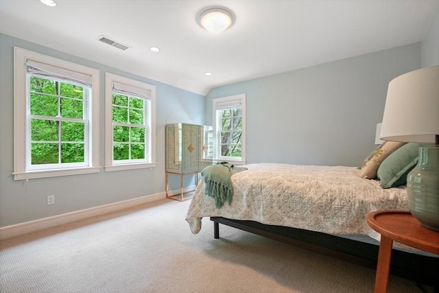 bedroom featuring carpet, lofted ceiling, recessed lighting, visible vents, and baseboards