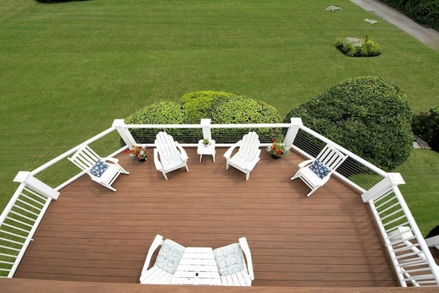 deck featuring a lawn