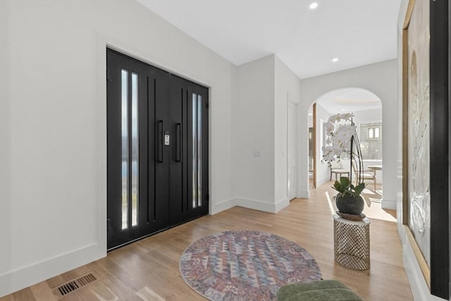 foyer with light wood-type flooring