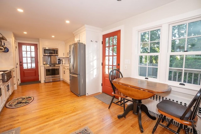 14 N Pleasant St, Dartmouth, MA 02748 - dining area with light wood-style floors and recessed lighting