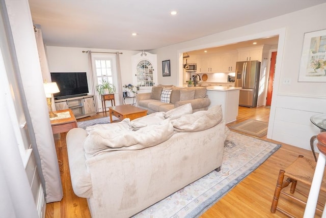 14 N Pleasant St, Dartmouth, MA 02748 - living area with light wood-style flooring and recessed lighting