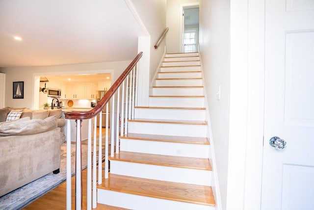 14 N Pleasant St, Dartmouth, MA 02748 - stairway with wood finished floors