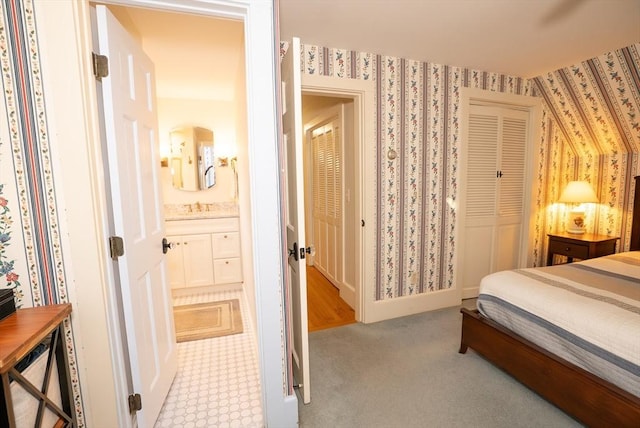 14 N Pleasant St, Dartmouth, MA 02748 - bedroom with wallpapered walls, carpet flooring, a closet, and connected bathroom