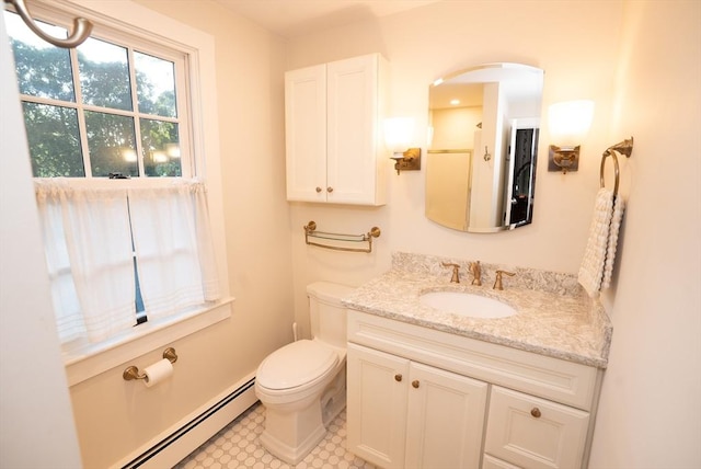 14 N Pleasant St, Dartmouth, MA 02748 - bathroom featuring baseboard heating and vanity
