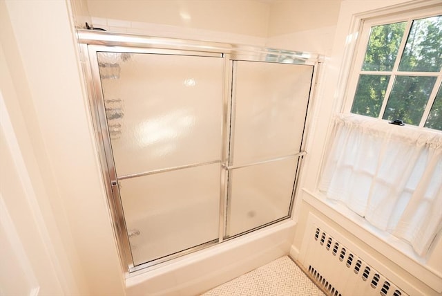 14 N Pleasant St, Dartmouth, MA 02748 - bathroom with radiator heating unit and enclosed tub / shower combo